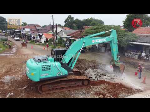 KOBELCO SK200 REMOVAL OF THE ASPHALT LAYER ON THE OVERPASS