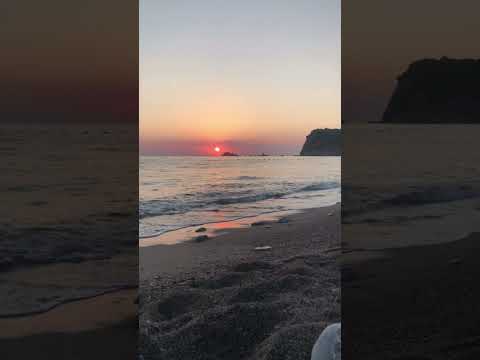 Beautiful sunset view at Buljarica beach in Montenegro filled with relaxing sounds of the sea.