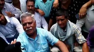 Ex minister Sukhnandan Choudhary along with locals block Tawi bridge, demands stop unscheduled power