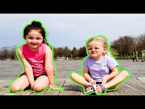 Kids Riding Their Bike And Playing By The River