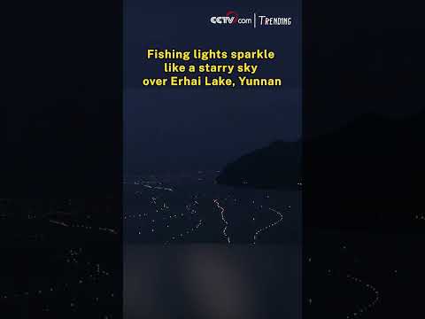 Fishing lights sparkle like a starry sky over Erhai Lake, Yunnan