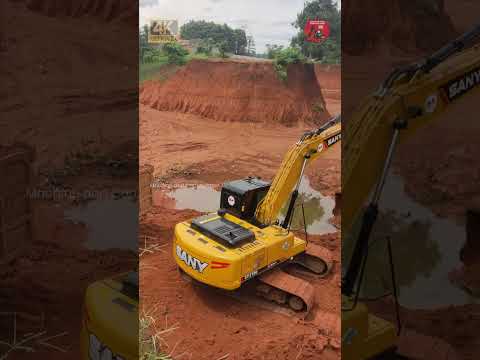 Excavator DEEP Digs and Loads Soil into The Truck