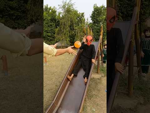 Water balloon prank on avengers spiderman superhero sliding on slide