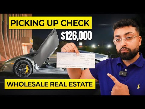 Picking up a Check From The Title Company for Wholesaling Real Estate