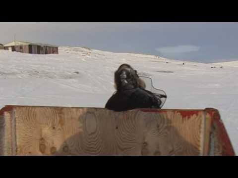 Arrival in snowmobile to Ravenscraig's log cabin - Sam Ford Fiord 2010 expedition