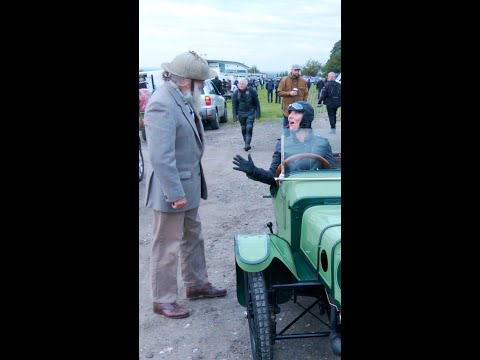 Man teaches woman to start 1914 Morgan Three-Wheeler