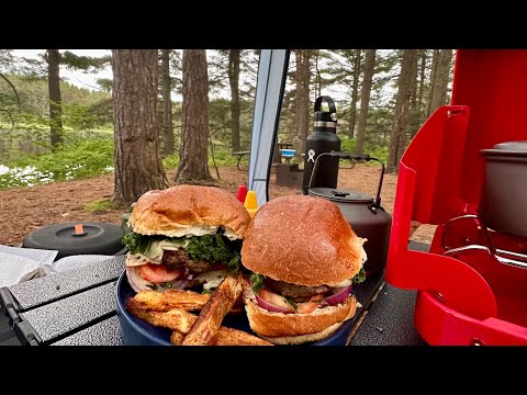 Burgers and fries cooking inside the Coleman Skyshade™ 8 x 8 ft. Screen Dome.