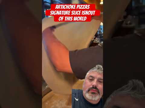 Artichoke pizzas signature slice isnout of this world