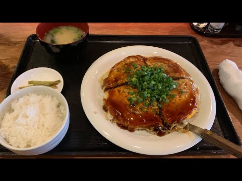 Okonomiyaki（ Japanese savoury pancake）in Osaka-Japan