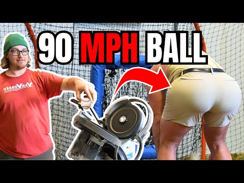 Baseball pitching machine versus mans BUTTOCKS