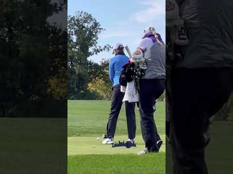 Golfers golfing