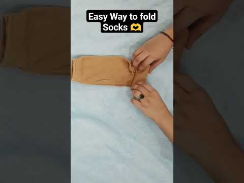 Socks folding hack 🫶#ytshorts #trending #shortsvideo #motivational #easy #hack  #socks #folding