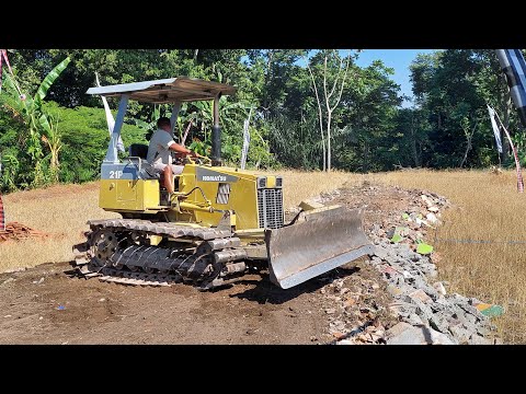 SMALL BULLDOZER KOMATSU D21P FILL AREA WITH MATERIAL