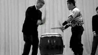 Team Canada 2005 athletes playing drums at Kyoto dinner