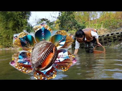 Unveil the pearl veil! The girl discovered a purple golden clam with enchanting pearls inside