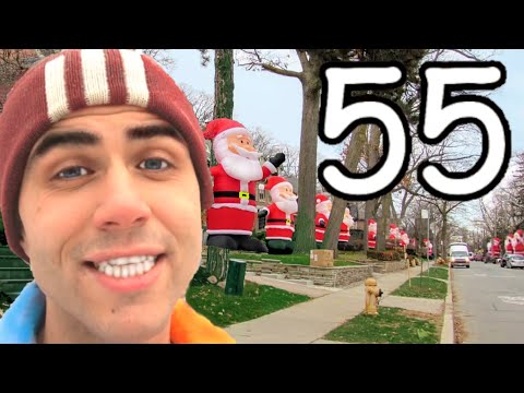 Why Are 55 GIANT Santas On This Street?