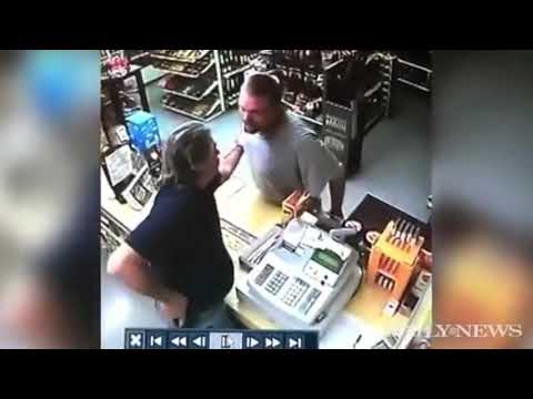 Robber pulls gun, liquor store clerk is faster but with Half Life SFX