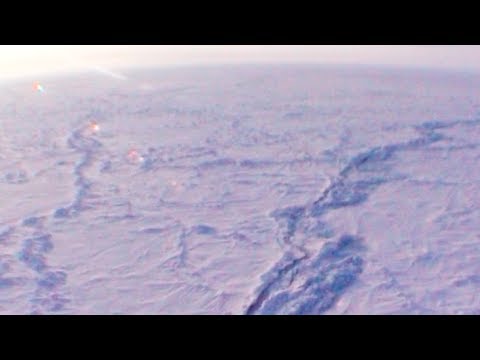 Flight in the helicopter over the Arctic Ocean - Geographic North Pole 2002 expedition