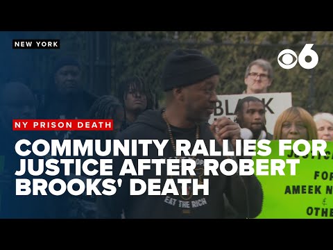 Community members rally for justice following the fatal prison beating of Robert Brooks