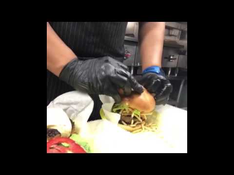 Burger assembly at Pipo Burgers on wheels Foodtruck Miami