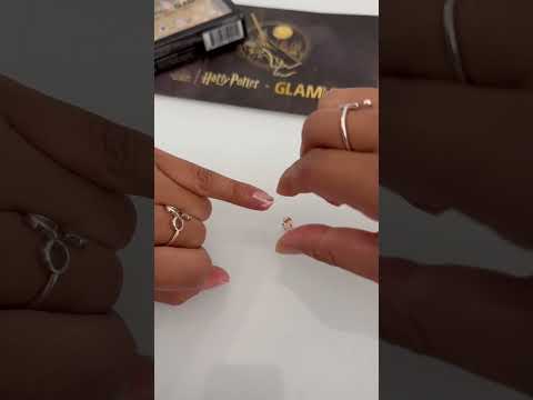 Applying the Hogwarts press on nails from Glamnetic x Harry Potter collection!