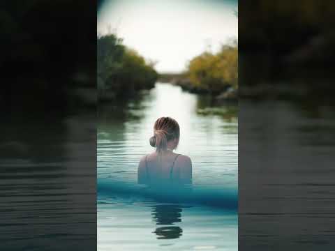 Dipping in a hidden lagoon during sunset 🌅