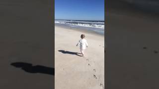 Macey running on Carolina Beach