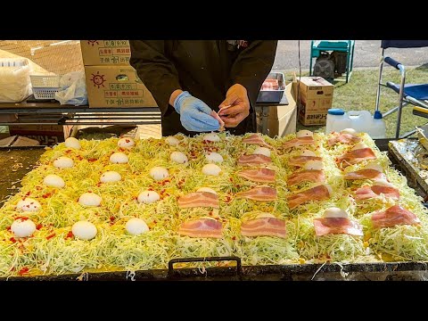 japanese street food - hiroshima style okonomiyaki お好み焼き hiroshimayaki