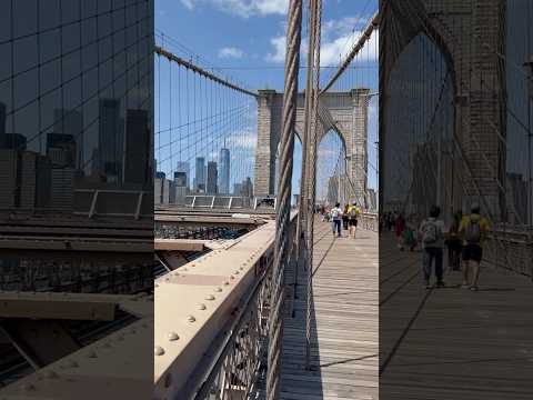 The Brooklyn Bridge pedestrian walkway offers stunning view of Manhattan skyline & Manhattan bridge!