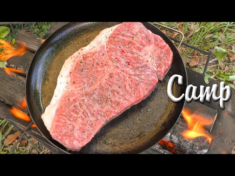 Steak lunch cooked over a bonfire