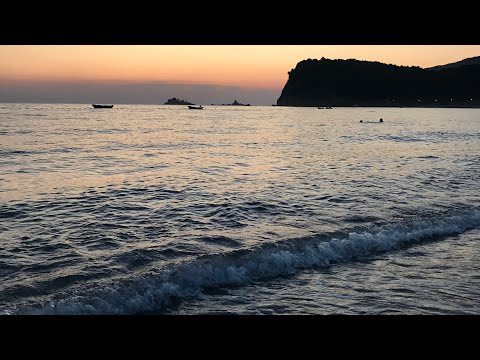 Beautiful sunset view at Buljarica beach in Montenegro filled with relaxing sounds of the sea.