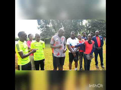 Denis Onyango gives out captain armband he wore in last Cranes game to Prosper U17 skipper.