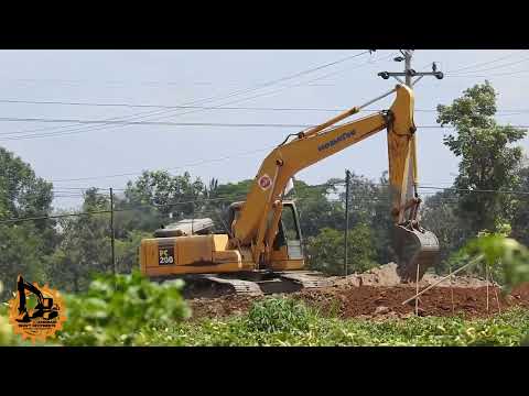 "Unstoppable Komatsu PC200 Excavator Transforming Toll Roads!"