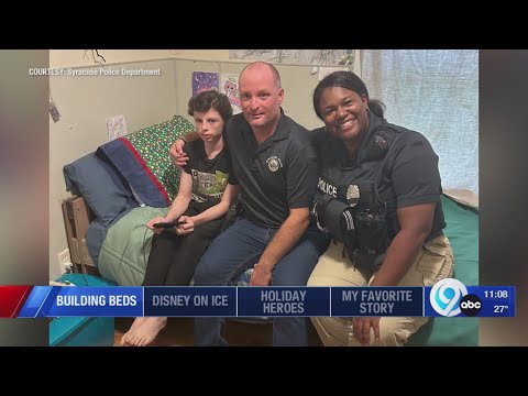 Two SPD officers help family build beds