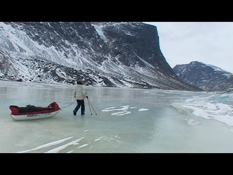 Walking on the ice of the Weasel river - Penny Icecap 2009 expedition