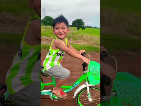 Little boy riding a bicycle falls on the side of the road || #shorts #viral #share #subscribe #cute