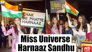 Fans cheer with flags and banners for Miss universe Harnaaz Sandhu at the airport