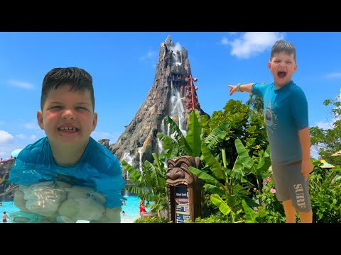 CALEB GOES INSIDE A VOLCANO WATERPARK PLAYGROUND! BEST WATERPARK Splash Pad for Kids!