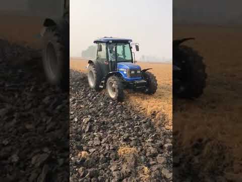 Sonalika 75 hp 4mb plough in field