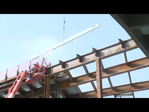 Steel beam raised at Albany Airport