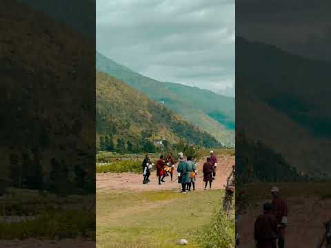 Happy dance when someone’s scores in team sport such as Archery in Bhutan. Such happy people!