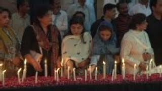 Candlelit vigil for bus attack victims