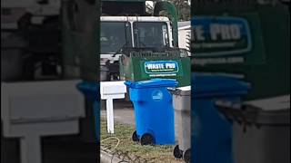 A 2021 Revving Mack LR McNeilus Pacific Front Loader on New Year's eve Trash