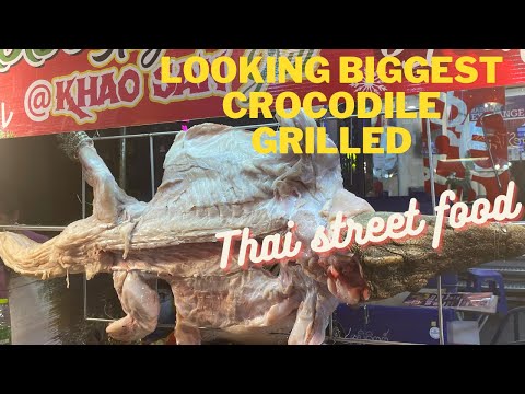 Biggest  crocodile grilled  यह केवल थाईलैंड स्ट्रीट मै बिकता हैं