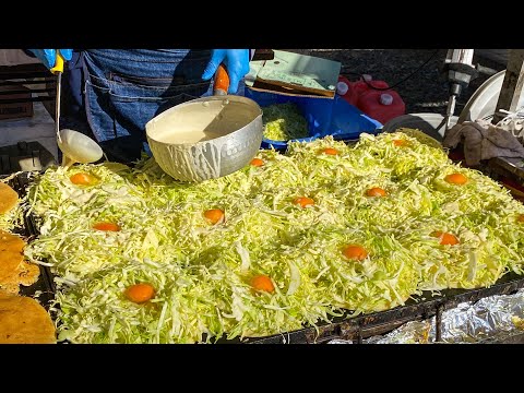 japanese street food - small but perfect okonomiyaki stall お好み焼き