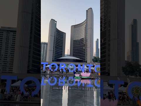 Nathan Phillips Square, with its popular “Toronto” sign, is  located in front of Toronto City Hall!