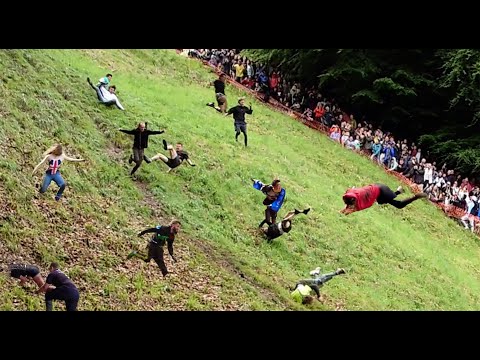 Cheese Rolling Race 2024: Strange Village festival Cotswolds UK