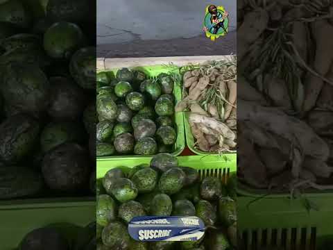 A Feriola is selling mixed pickles of various fruits