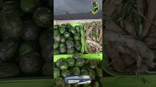 A Feriola is selling mixed pickles of various fruits