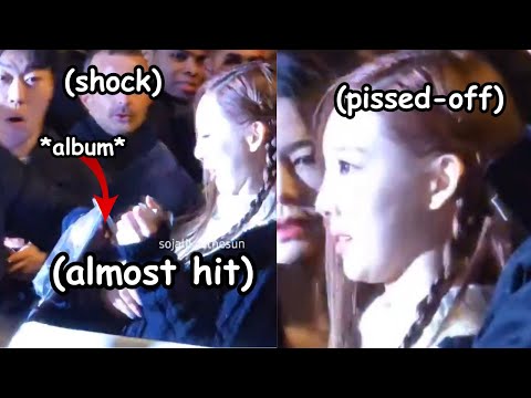 twice nayeon almost hit at the face when someone rude fan did this to her in fashion week